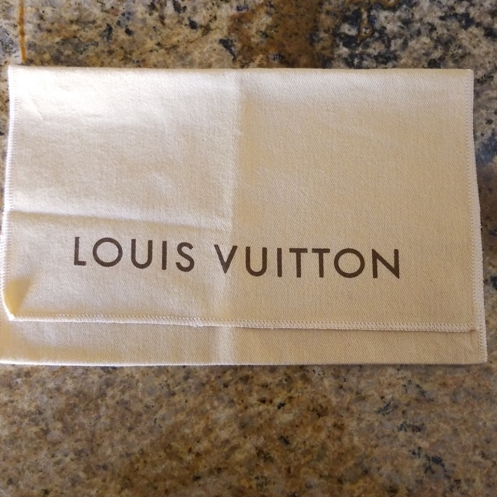 Authentic Louis Vuitton Dustbag.